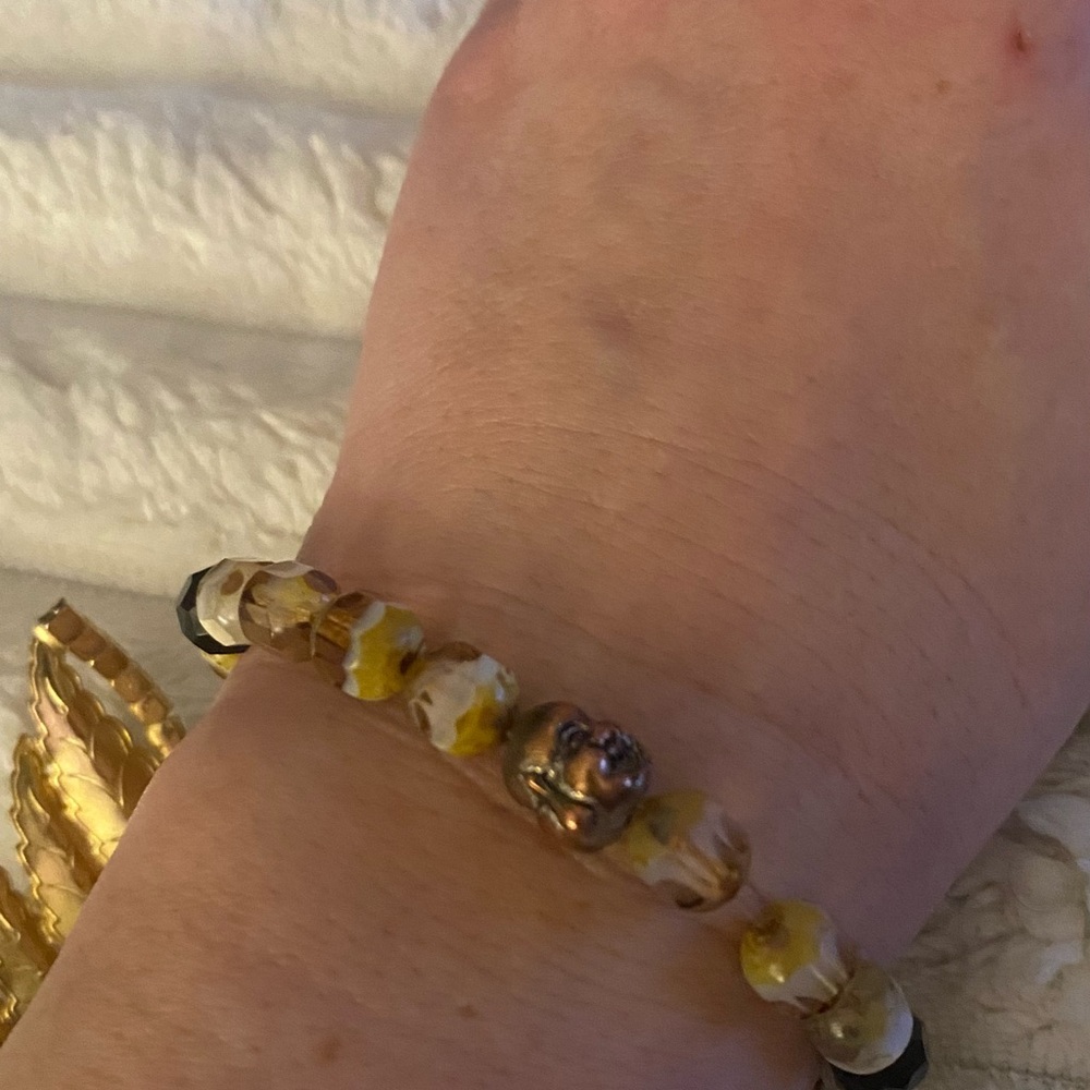 Beaded Bracelet Gold Accents.Buddha real beads made by jeweler at boutique